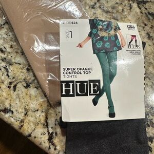 2 pairs tights. New. No tags.